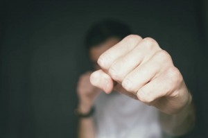 man punching with fist