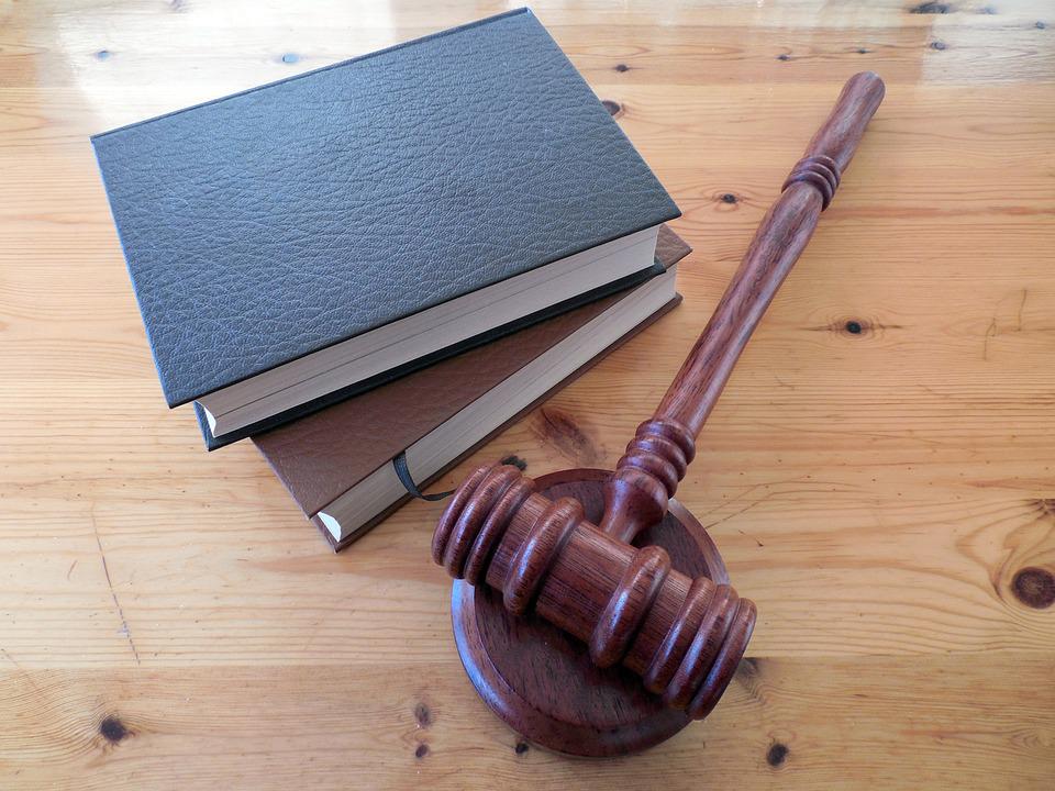 gavel and legal books on table