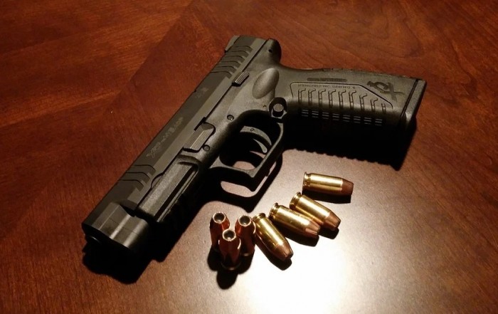 handgun with bullets