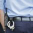 police officer entering premises with search warrant