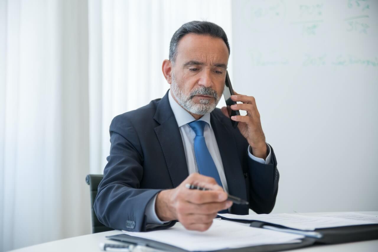 lawyer talking with client on the phone