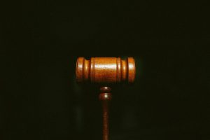 gavel against a black background